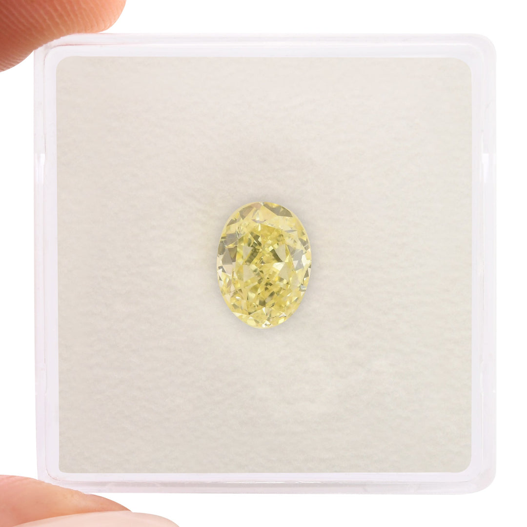 1.15 Carat Fancy Light Yellow Oval Diamond VS2 GIA