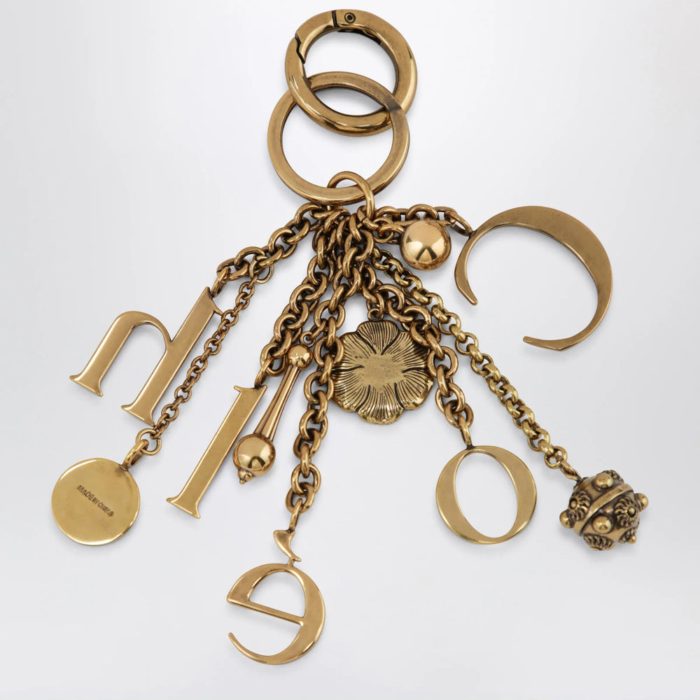 Chloé - Bag charm keyring Symbols Logo in vintage gold brass Brand Apparel & Accessories > Jewelry U