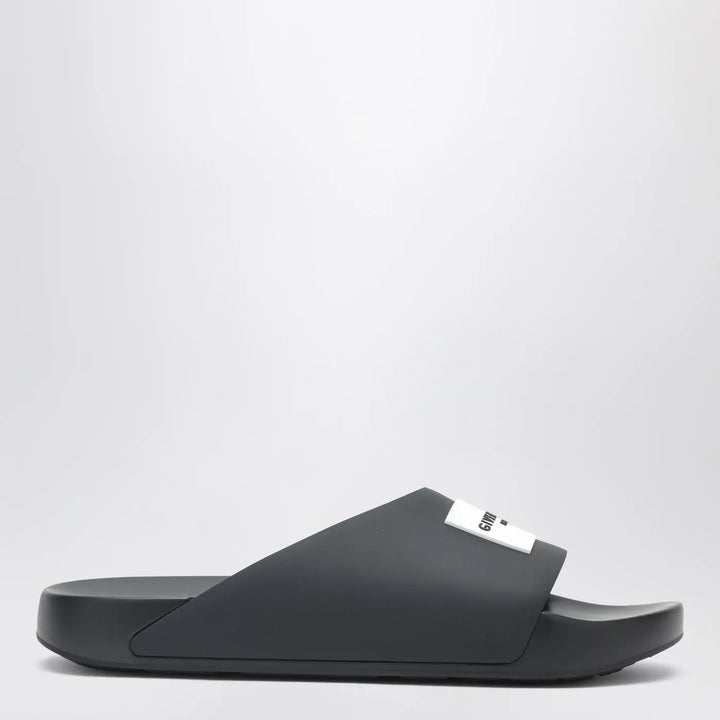 Givenchy - Label flat mules in black rubber Brand Shoes